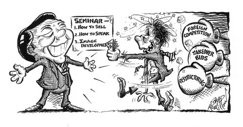 Businessman turning to self-improvement seminars due to foreign competition,takeover bids, and restructuring.