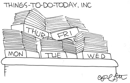 Things-to-do-today: Daily workboxes piled up on desk.