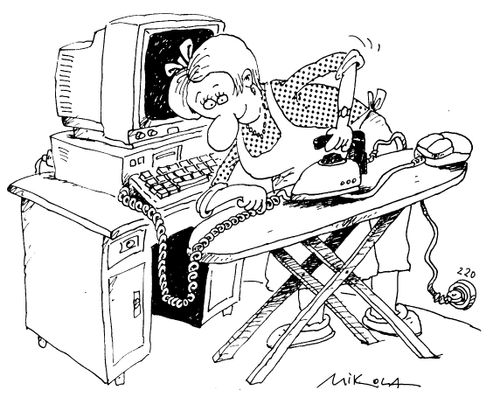 Woman ironing the curly cord from a computer mouse