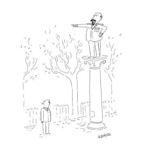 Man following where a statue is pointing.