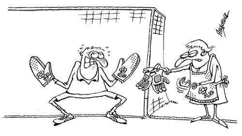 Goalie in trouble with his wife as he is using her oven gloves in goal