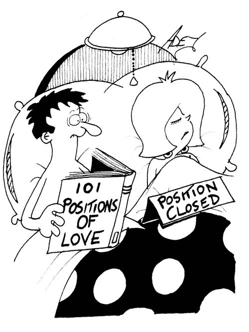 Woman with a 'Position closed' sign in bed.