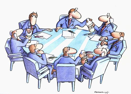 People at a meeting passing around cotton wool for their ears.