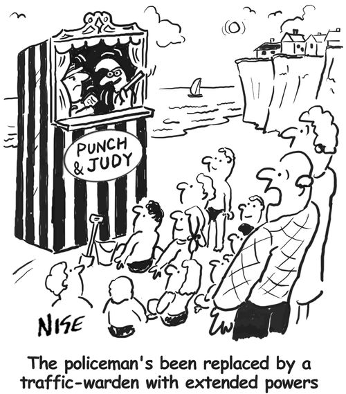 Punch & Judy. 'The policeman's been replaced by a traffic-warden with extended powers'.