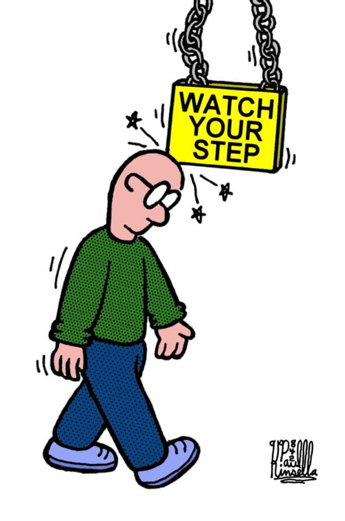 Man walks into 'Watch your step' sign.