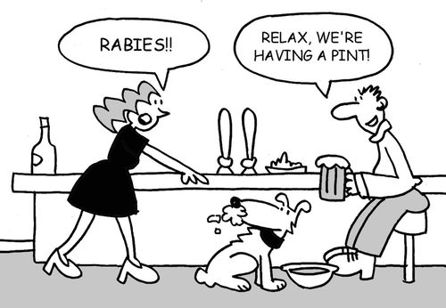 Woman pointing at dog with white froth round his mouth - Rabies!! Relax, we're having a pint!