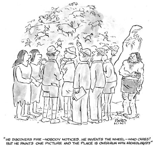 Cave paintings being discovered by archaeologists.
