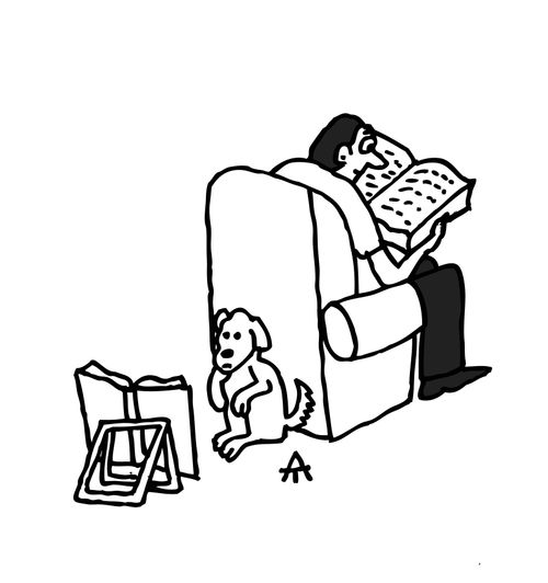A man and his dog both reading.