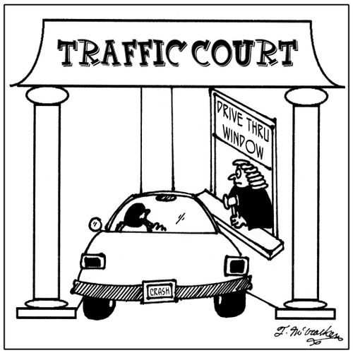 At 'Traffic Court' a man in a car is at the 'Drive Thru Window.'