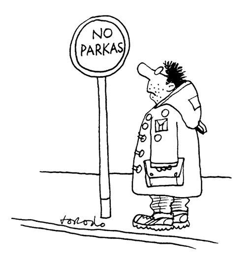 Man wearing a parkas is baffled by a sign saying 'No Parkas'