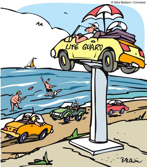 Driving on the Beach - Lifeguard on a hydraulic lift.
