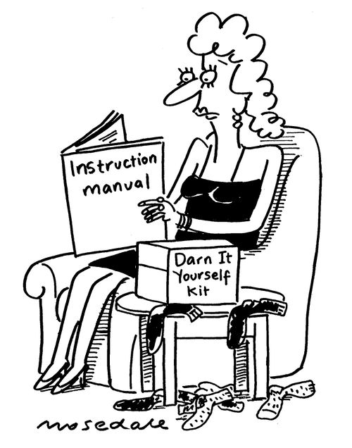 Woman reading instruction manual on how to darn socks.