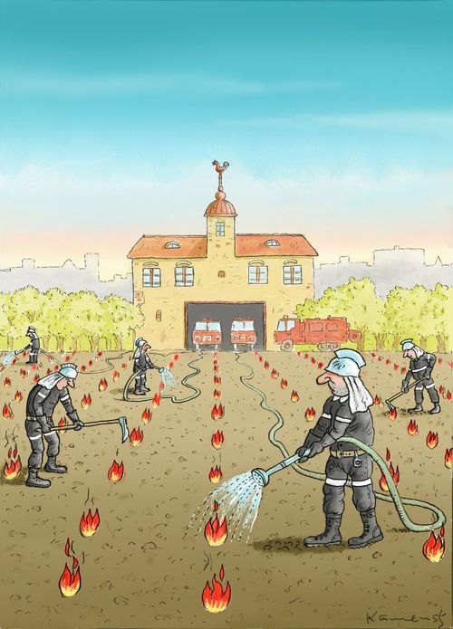Firemen keeping their fire under control.