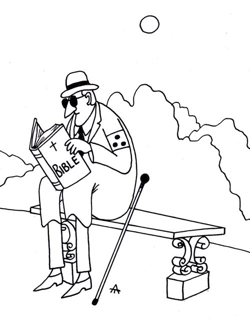 Blind man reading the bible.