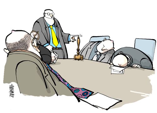 Businessman at meeting with mallet.