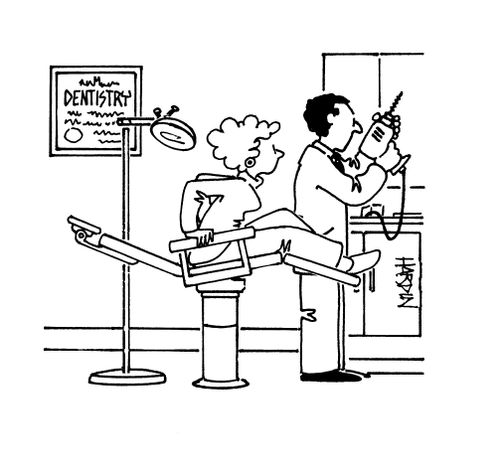 Dentist preparing woodwork drill for dentistry.