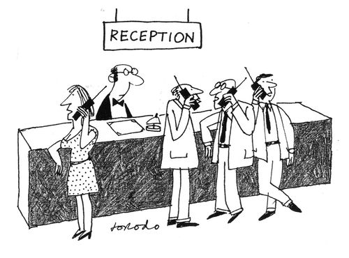 Reception full of people on mobile phones.