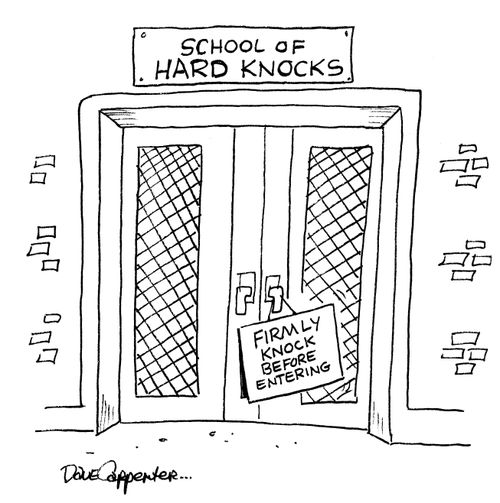 A sign on the school of hard knocks says firmly knock before entering.