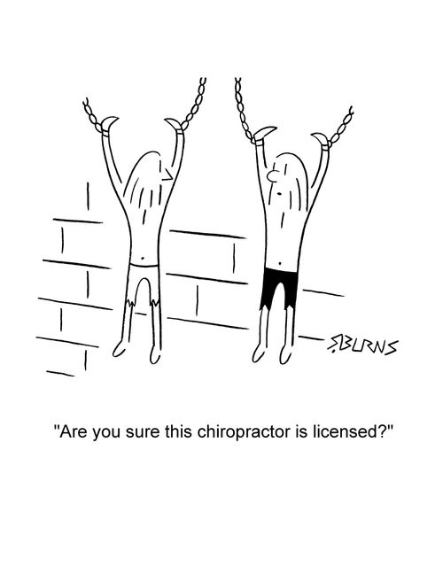 Guy hanging in dungeon to other: 'Are you sure this chiropractor is licensed?'