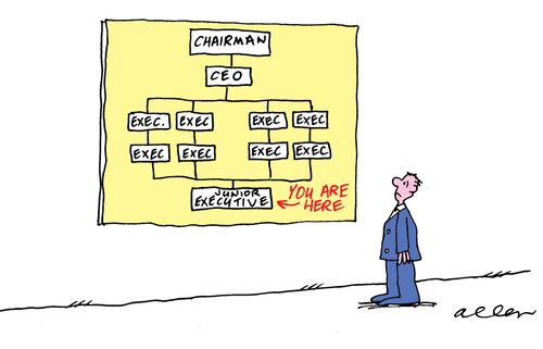 Man looking at company organisation chart, he's at the very bottom.