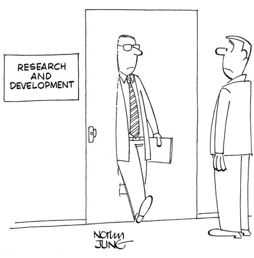 Scientist working in research and development department walks through door.