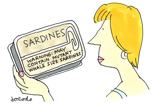 Woman with sardine tin with warning that it may contain mutant whale-size sardines.