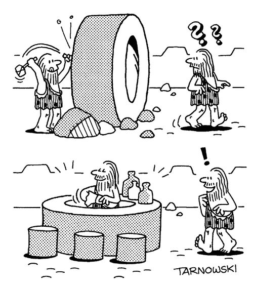 Caveman turning the wheel into a bar.