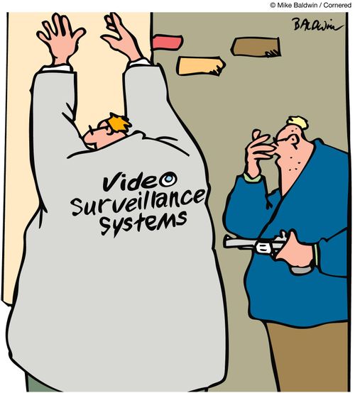 Robber holding up a man who is wearing a jacket branded 'Video Surveillance Systems'.