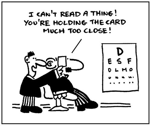 'I can't read a thing. You're holding the card much too close.'