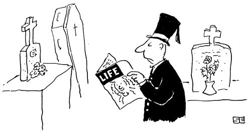 Undertaker reading Life Magazine.