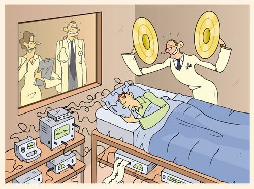 Doctor holding cymbals above sleeping patient in treatment for a sleep disorders.