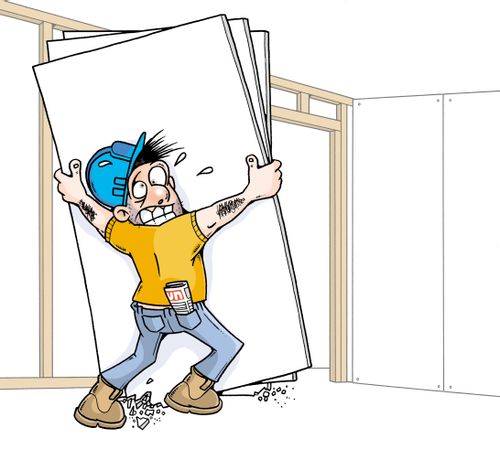 Workman lifting plasterboard.
