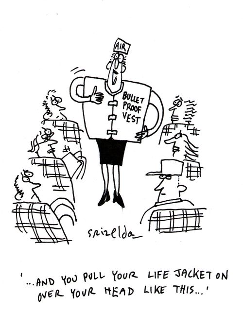 Air hostess wearing bullet proof vest saying, '...and you pull your life jacket on over your head like this'