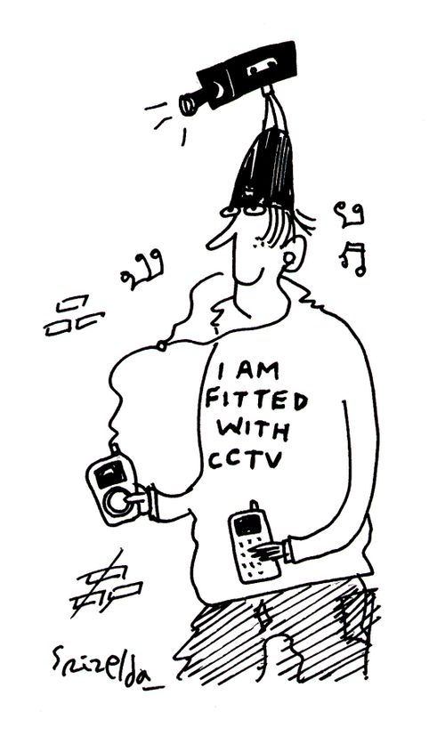 Teenager with 'I am fitted with cctv' shirt.