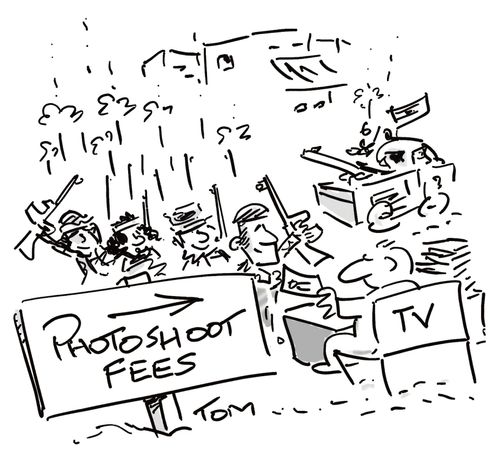 Libyan rebels firing into air for TV.