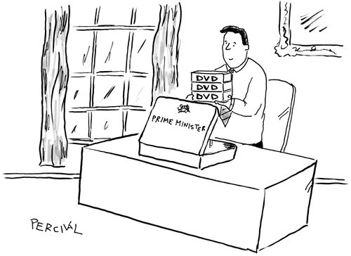 British PM David Cameron taking some DVDs from his ministerial red box.