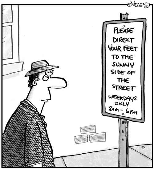 Sign on sidewalk: 'Please direct your feet to the sunny side of the street...'