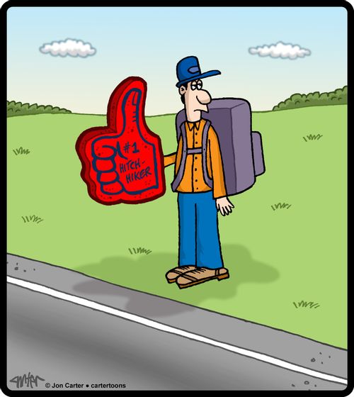 Man with a giant foam thumb which says, '#1 Hitchhiker'.