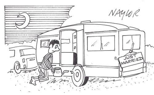 Man oiling a honeymoon caravan.