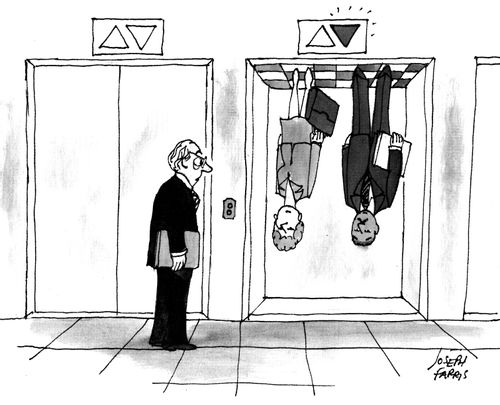 Elevators, one with people upside down in it.