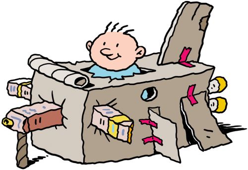 Small child in plane made from cardboard boxes