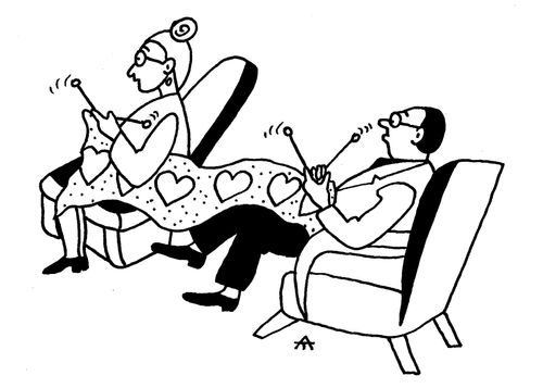 Man and woman knitting together.