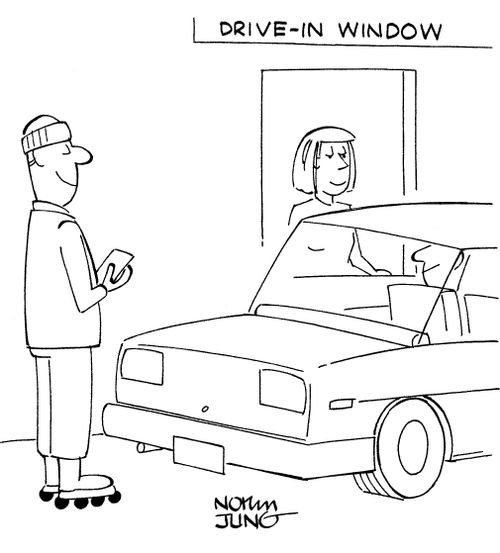 Man in line to use the drive-in window at bank.