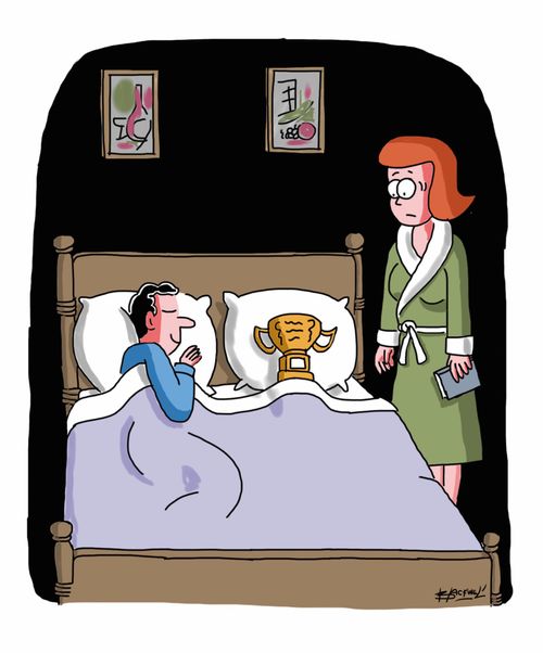 Husband sleeping with trophy he won.