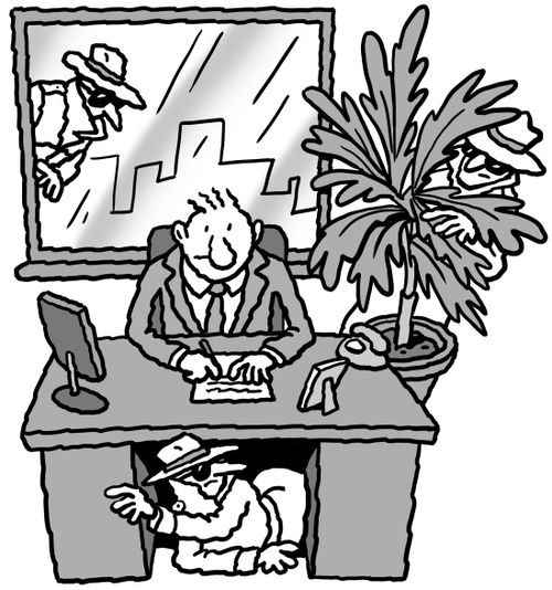 Spies surround a man at his office desk