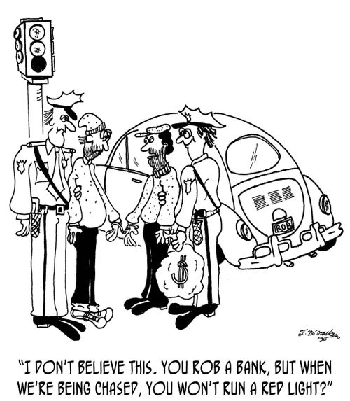 "I don't believe this. You rob a bank, but when we're being chased, you won't run a red light?"