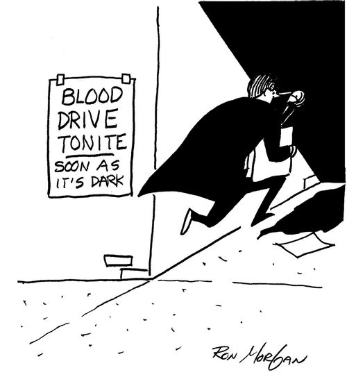Vampire puts up Blood Drive signs.