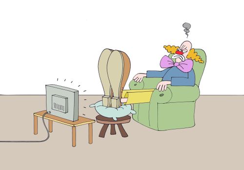 Clown with big shoes can't see the television screen.