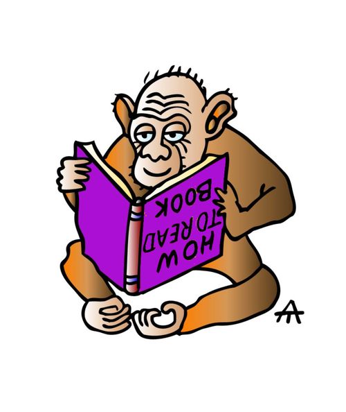 Monkey tries to read a book.