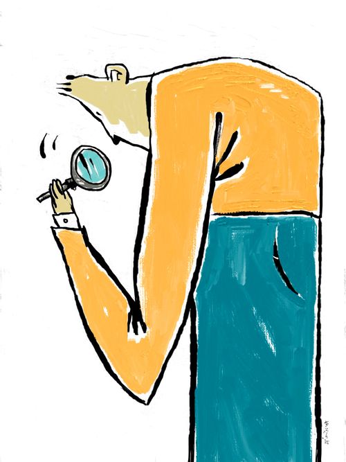 Business man with magnifying glass